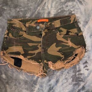 Distressed camo denim shorts